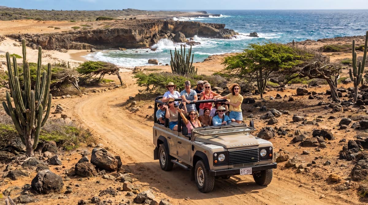 Open-air safari jeep on a rugged trail in Arikok National Park, Aruba