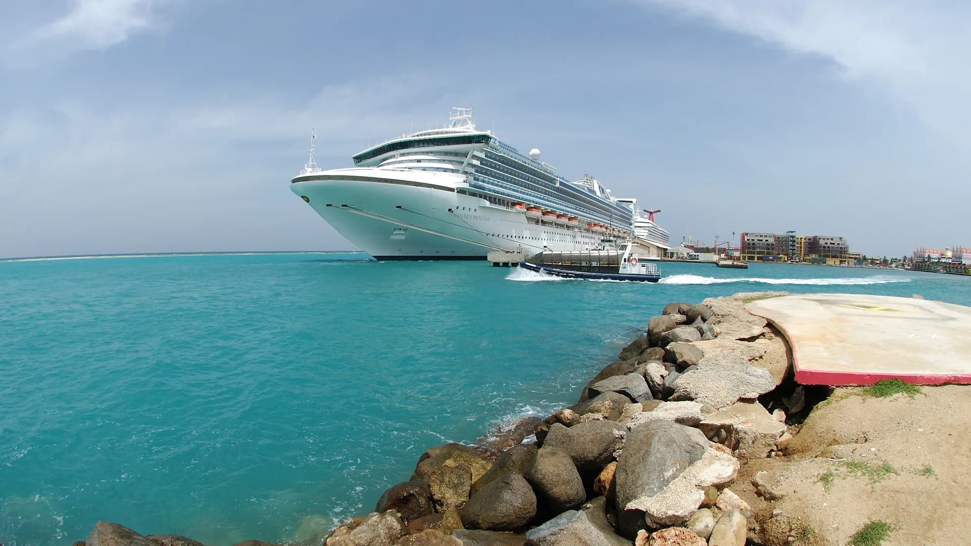 A cruise ship moored in Oranjestad harbour, Aruba